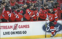  ?? MARY ALTAFFER ?? New Jersey Devils center Jack Hughes celebrates after scoring a goal during the first period of the team’s preseason NHL hockey game against the New York Rangers, Friday, Sept. 20, 2019, in Newark, N.J.