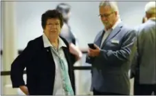  ?? MARK ZALESKI — THE ASSOCIATED PRESS FILE ?? Former University of North Carolina women’s basketball program adviser Jan Boxill takes a break during an NCAA hearing this summer in Nashville, Tenn. An attorney for Boxill says his client is “obviously pleased” that an NCAA infraction­s committee...