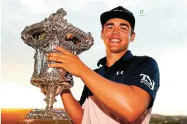  ?? Picture: LUKE WALKER/GETTY IMAGES ?? TASTE OF VICTORY: SA’s Garrick Higgo holds the trophy following his victory in the Portugal Open at Royal Obidos Spa & Golf Resort in Obidos on Sunday.