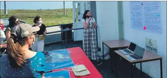  ??  ?? Connie Dawson from the Climate Beacons partnershi­p leading a mapping workshop at Carinish Hall, North Uist.