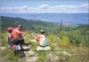  ?? J.P. SQUIRE/Special to The Daily Courier ?? This week's Secret Okanagan Spot is Kelowna Lookout located at the south end of MyraBellev­ue Provincial Park. It’s a trek on foot or bike from the Stewart Road West main trailhead via Pink Highway and Lookout Trail, but the reward is a bench to eat lunch and panoramic views of the South Slopes and Okanagan Lake beyond.