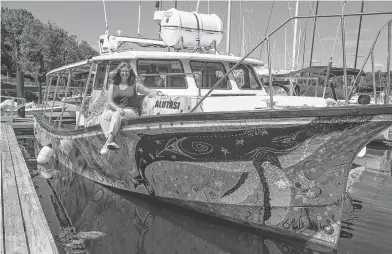  ?? RYAN TAPLIN • THE CHRONICLE HERALD ?? Sue Molloy, project lead for the Glas Ocean electric conversion project, poses for a photo aboard the Alutasi at the Royal Nova Scotia Yacht Squadron on Aug. 13, 2020.