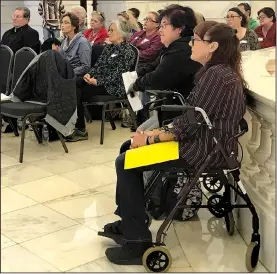  ?? Arkansas Democrat-Gazette/KAT STROMQUIST ?? Kerry Heffner (front right) listens to speakers at a Don’t Punish Pain rally at the state Capitol in October. Heffner and others with chronic pain say opioids work better than other treatments.