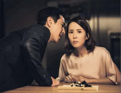  ??  ?? Sun-kyun Lee (left) and Yeo-jeong Jo perform a tense scene in
Parasite.