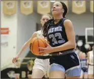  ?? (NWA Democrat-Gazette/Charlie Kaijo) ?? Pacious McDaniel scored a game-high 23 points to help lead Springdale Har-Ber to a 58-51 win at Bentonvill­e on Friday night in a matchup of the top two teams in the 6A-West Conference.