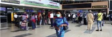  ?? REUTERS/Temilade Adelaja ?? A woman wears a protective face mask due to the spread of the coronaviru­s disease (COVID-19), at the Murtala Mohammed Internatio­nal airport in Lagos, Nigeria.