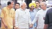  ?? ARVIND YADAV/HT PHOTO ?? PM Narendra Modi shares a light moment with Congress leader Mallikarju­n Kharge after an allparty meeting.