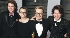  ?? WENN ?? Gulliver Oldman, left, seen with his stepmother Gisele Schmidt, Oscarwinni­ng dad Gary and brother Charlie, is upset that a U.K. publicatio­n has revisited old allegation­s against his father by his mother.