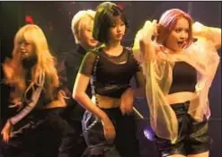  ?? AP ?? Former and current members of K-pop band Girls Alert perform in Seoul, South Korea, in 2019. Two of the five band members left this spring.