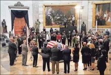  ?? J. Scott Applewhite ?? Members of the Congressio­nal Black Caucus, say farewell at the conclusion of a service for the late Rep. John Lewis, D-GA., a key figure in the civil rights movement and a 17-term congressma­n from Georgia, as he lies in state at the Capitol in Washington, Monday, July 27, 2020. (AP Photo/j. Scott Applewhite, Pool)