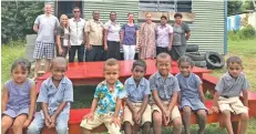  ??  ?? Kindergart­en students with various stakeholde­rs present at the hand over at Namata Primary School in Momi, Nadroga, on March 28, 2018. Photo: Waisea Nasokia