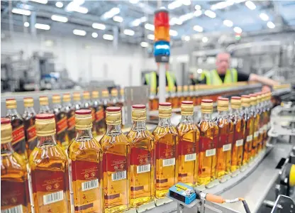  ??  ?? Johnnie Walker whisky is bottled at Diageo’s factory in Leven, where workers plan to strike.