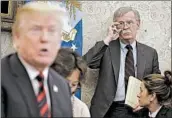  ?? OLIVER CONTRERAS/GETTY ?? John Bolton, right, offered a testy assessment of critics who have questioned the president’s negotiatin­g style.