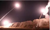 ?? — AFP ?? This handout photo provided by Iran's Revolution­ary Guard official website via SEPAH News shows missiles being launched from an undisclose­d location to target militants in eastern Syria early on Monday.
