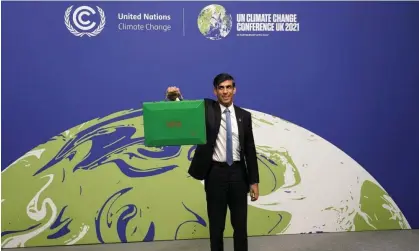  ?? Photograph: Alberto Pezzali/AP ?? Rishi Sunak as chancellor at the Cop26 climate summit in Glasgow in November 2021. The prime minister has announced he will not attend this year’s vital Cop27 in Sharm el-Sheik.