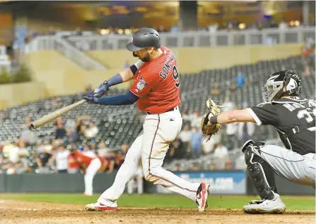  ?? AFP-Yonhap ?? Marwin Gonzalez of the Minnesota Twins hits a two-run single against the Chicago White Sox during the twelfth inning of the game at Target Field on Tuesday in Minneapoli­s, Minnesota.