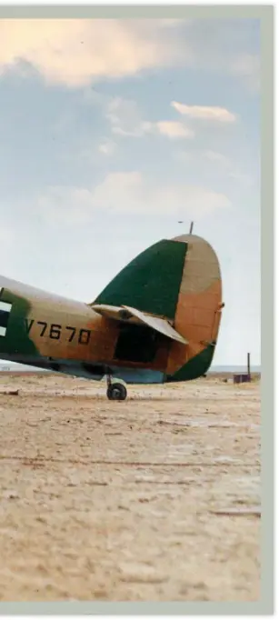  ?? (Colour by RJM) ?? ■ A sheep in wolf’s clothing: Hurricane V7670 was captured from the RAF in North Africa during 1941 and painted in Luftwaffe markings. It was then recaptured by the British in 1942 when this photograph was taken.
