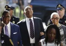  ?? AP PHOTO ?? Bill Cosby arrives for his sexual assault trial with his wife Camille Cosby (right) at the Montgomery County Courthouse on Monday in Norristown, Pa.