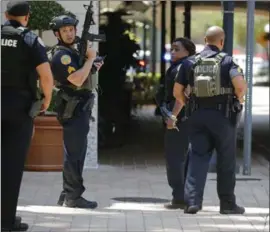  ?? AL DIAZ, THE ASSOCIATED PRESS ?? Miami police are on scene after a shooter opened fire at a gym at the Shops at Merrick Park in Coral Gables, Fla., on Saturday.