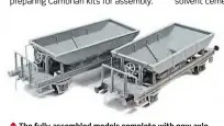  ??  ?? ↑ The fully assembled models complete with new axle boxes and Oleo buffers fitted to the nearest wagon. There remains some finishing work including thinning down of the platform hand rail.