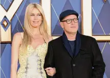  ?? Shane Anthony Sinclair/Getty Images ?? Vaughn and his wife, model Claudia Schiffer, attend the premiere of “Argylle.”