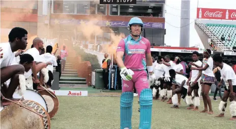  ??  ?? HOT STUFF DURBAN Heat batsmen Morné van Wyk walks through plumes of smoke to bat at Kingsmead on Friday, unaware of the off-field drama which has prompted questions about illegal sports betting and match-fixing still shrouding the game.