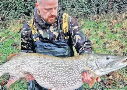  ?? ?? Lloyd Watson, an angler from Manchester, says he has received messages from all over the world after landing the 47lb 5oz fish at a lake in Somerset