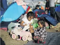  ?? PHOTO: REUTERS ?? In limbo . . . Migrant children, part of a caravan of thousands of migrants from Central America trying to reach the United States, play in a temporary shelter in Tijuana, Mexico.