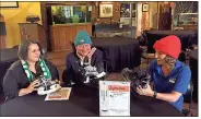  ?? / Doug Walker ?? Kamil McElwee (from left), Thomas Kislat and Emma Wells bundle up for an ICE Experience planning session at the Rome-Floyd ECO River Education Center.