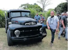  ??  ?? Deon Grobler with his 1947 Ford V8 with a jag suspension and power steering.