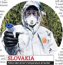  ??  ?? SLOVAKIA
Police take driver’s temperatur­e at border