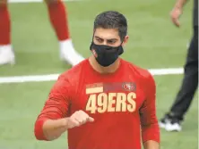  ?? Bill Kostroun / Associated Press ?? Jimmy Garoppolo, pictured Sept. 27, passed the eye test Thursday in practice, planting firmly on his right ankle.