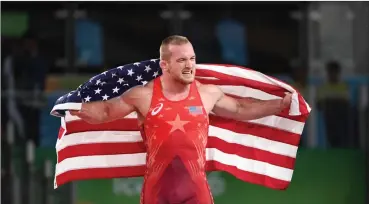  ?? Washington Post photo ?? Kyle Snyder, who was the 2016 Olympic 97-kilogram freestyle wrestling champion, improved his skills at Ohio State University. With NCAA program cutting Olympic sports teams, the USOPC is concerned about the future.