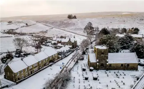  ?? (PA) ?? St Mary’s Church in Goathland, North Yorkshire, surrounded by snow yesterday