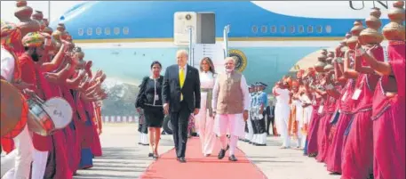  ?? AFP ?? Prime Minister Narendra Modi welcomes US President Donald Trump and First Lady Melania Trump at Sardar Vallabhbha­i Patel Internatio­nal Airport on Monday.
■