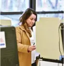  ?? VICTOR HILITSKI/FOR THE SUN-TIMES ?? Ald. Anabel Abarca votes at the Thomas Early Childhood Center, at 3625 S Hoyne, on Tuesday.
