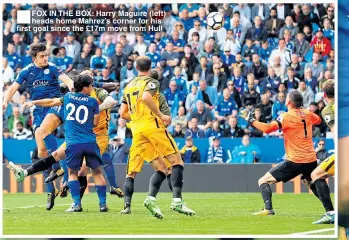  ??  ?? ■
FOX IN THE BOX: Harry Maguire (left) heads home Mahrez’s corner for his first goal since the £17m move from Hull