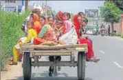  ?? PTI ?? Villagers leave with their belongings for safer places after heavy shelling from across the border, in Jammu’s Arnia on Monday.