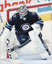  ?? GETTY IMAGES FILE PHOTO ?? Winnipeg Jets goaltender Connor Hellebuyck signed a six-year, US$37-million extension in July.