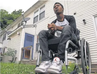  ?? ALLEN G. BREED, AP ?? Rayquan Briscoe of Wilmington, Del., was 17 when he was paralyzed by a stray bullet. “Bullets don’t have no names,” he says.