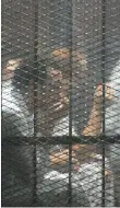  ?? AFP ?? Accused in a soundproof glass dock at the courtroom in Cairo on Friday