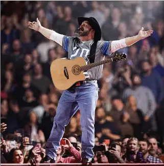  ?? PHOTO COURTESY OF KEN SETTLE ?? Garth Brooks performs live at Ford Field on Feb. 22, 2020 — about a month before the COVID-19 pandemic shut down most live music shows for the rest of the year.