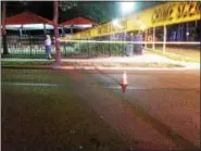  ?? EVAN BRANDT — DIGITAL FIRST MEDIA ?? A cone, usually used to mark the location of a spent bullet casing, sits in the middle of North Washington Street at the scene of a double shooting near the intersecti­on with Chestnut Street on July 5. The cone is just steps away from a neighborho­od...