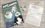  ?? JESSICA YADEGARAN — STAFF ?? Be the first to get rid of all of your dice in Playroom Entertainm­ent’s Pass the Pandas game by rolling pandas, bamboo or water droplets.