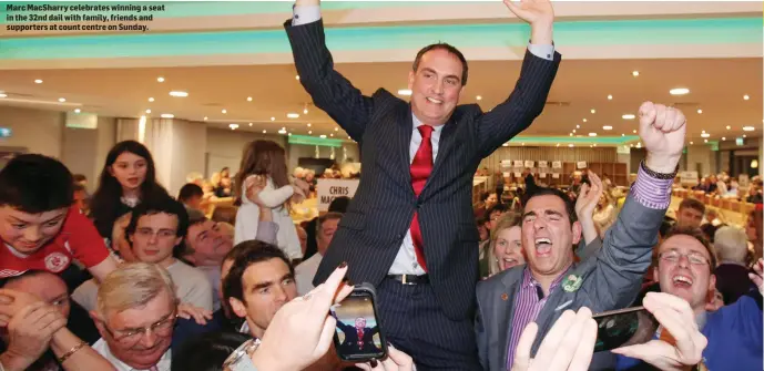  ??  ?? Marc MacSharry celebrates winning a seat in the 32nd dail with family, friends and supporters at count centre on Sunday.