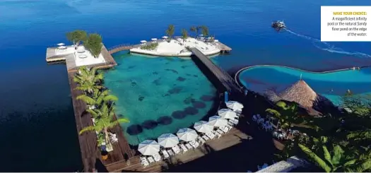  ??  ?? HAVE YOUR CHOICE: A magnificie­nt infinity pool or the natural Sandy floor pond on the edge of the water.