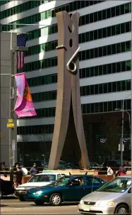  ?? AP PHOTO BY DAN LOH ?? Pop artist Claes Oldenburg’s “Clothespin” sculpture is displayed in the Center City section of Philadelph­ia on Friday, March 1, 2002. Oldenburg died Monday, July 18, 2022, in Manhattan, according to his daughter, Maartje Oldenburg. He had been in poor health since falling and breaking his hip a month ago. He was 93.