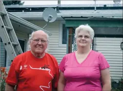  ?? NEWS PHOTO MO CRANKER ?? Neville and Denise Palmer have decided to invest solar panels after the provincial government launched a rebate program to help Albertans afford them for their homes.