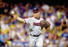  ?? ASSOCIATED PRESS ?? MINNESOTA TWINS’ BRANDON KINTZLER in action during the ninth inning of a July 26 game against the Los Angeles Dodgers in Los Angeles. Kintzler, who was traded to the Washington Nationals, was one of several notable MLB relievers dealt Monday.