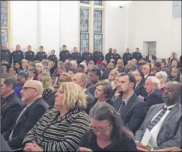  ?? BRAD SCHRADE / BRAD.SCHRADE@AJC.COM ?? Residents listen to LaGrange Police Chief Lou Dekmar at Warren Temple United Methodist Church on Thursday. Dekmar apologized for his agency’s role in the 1940 lynching of Austin Callaway.